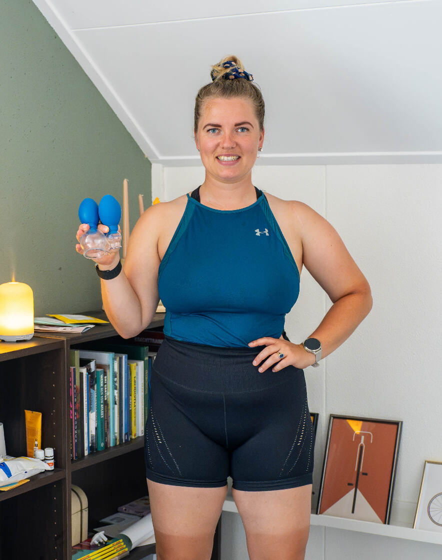 Kirsten Boerrigter behind the treatment table at her practice